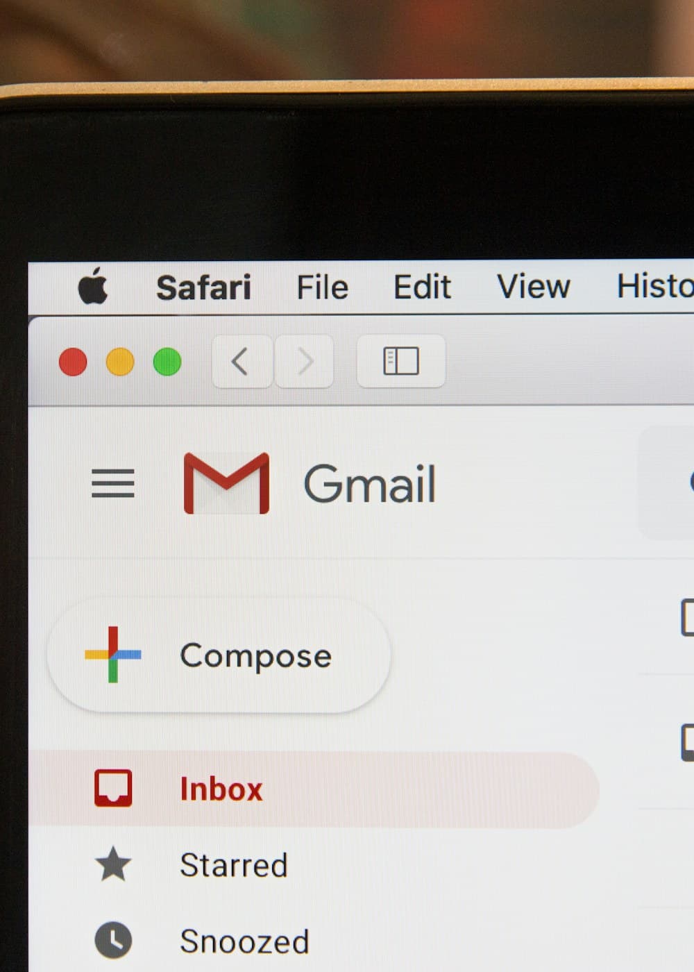 Laptop screen showing a professional email inbox